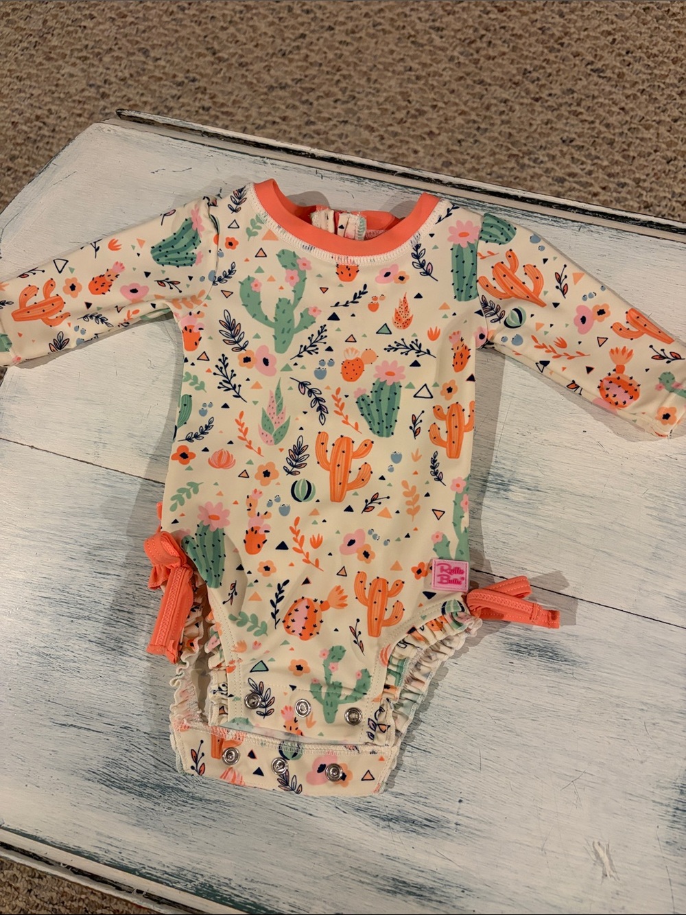 Ruffle Butts Cream Cactus-Print Long-Sleeve One-Piece with Coral Trim size 0-3mo